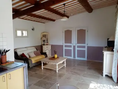 a living room with a couch and a table at Holiday Home Provenzalisches Ferienhaus mit Charme auf dem Land mit Pool by Interhome in Villars