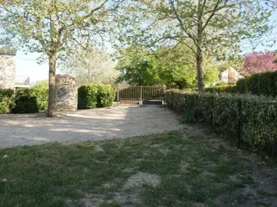 a park with a bench and trees and a fence at Holiday Home Schöne provenzalische Villa Les Carlets mit Pool by Interhome in Saignon