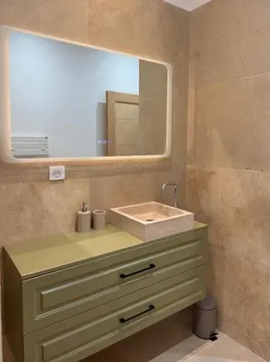 a bathroom with a sink and a mirror at Esprit Lubéron, Le Romarin, logement entier in Le Thor
