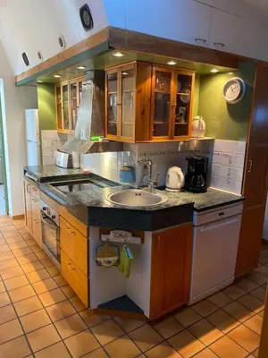 a kitchen with a sink and a counter at Danie, maison des oliviers et vue Luberon in Maubec