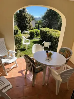 a white table and chairs on a patio at Village Pont Royal en Provence - maeva Home - Appartement 2 pièces 5 personnes - Sélection MAE-1083 in Mallemort