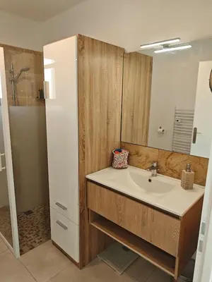 a bathroom with a sink and a mirror at Casa LoVaPi Cozy recent 2-bedroom house, garden, private parking in Salon-de-Provence