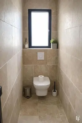 a bathroom with a toilet and a window at Villa Alberta Charming 10-person villa in Provence in Éguilles