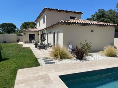a house with a swimming pool in front of it at Villa Alberta Charming 10-person villa in Provence in Éguilles