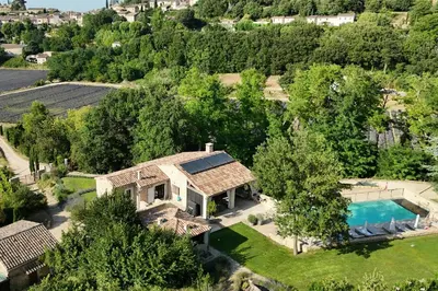 an aerial view of a house with a swimming pool at Five-Bedroom Estate Above Ménerbes Village in Ménerbes