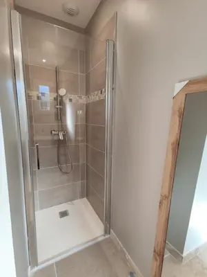 a shower with a glass door in a bathroom at New Villa in Provence La Modèna in Modène