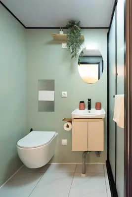 a bathroom with a toilet and a sink at Sous les étoiles du Luberon, Tiny House, Ménerbes in Ménerbes