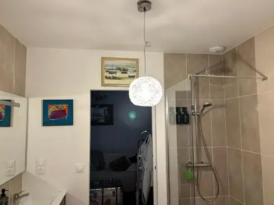 a bathroom with a shower and a sink and a shower at Villa Lésina Bed & Breakfast in Apt
