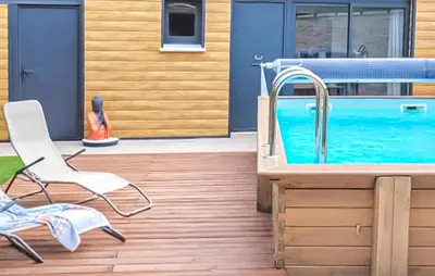 a deck with a pool and a chair and a sink at Nice Home In Jonquerettes in Jonquerettes