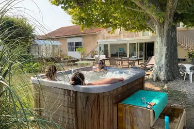 a group of people in a hot tub at 