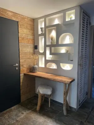 a bathroom with a wooden counter with two sinks at Villa Luxury Lagoon - Aix en Provence in Ventabren