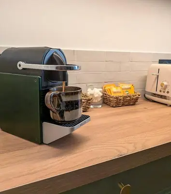 a coffee maker sitting on top of a counter at Plein centre d'Aix, bel appartement T2 rénové in Aix-en-Provence