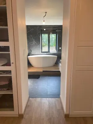 a bathroom with a bath tub on a counter at Villa moderne tout confort in Salon-de-Provence
