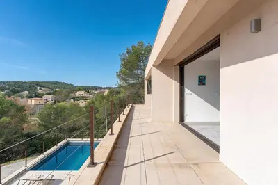 a house with a swimming pool on a balcony at Elynéa - Vue panoramique - Haut standing - Piscine in Rognes