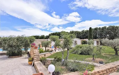 a villa with a pool and a garden at Beautiful Home In Lancon De Provence in Lançon-Provence