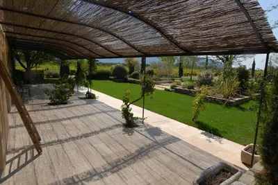 an overhead view of a garden with a patio at Clos De La Fontaine in Cabrières-dʼAvignon