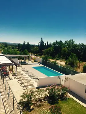 a view of a swimming pool on top of a house at Studio Vert Aix-en-Provence terrasse, piscine, parking in Aix-en-Provence