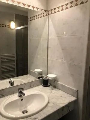 a bathroom with a sink and a mirror at Bastidon la Cicada in Gordes