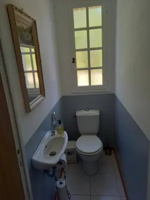 a bathroom with a toilet and a sink at Lou Vergié Maison Provencale au pied du Luberon in Saint-Martin-de-Castillon