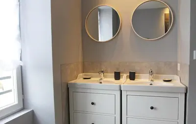 a bathroom with two sinks and two mirrors at Cozy Home In Pernes Les Fontaines in Pernes-les-Fontaines