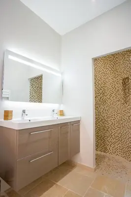 a bathroom with a sink and a mirror at L'Oustau D'Alberta in Aix-en-Provence