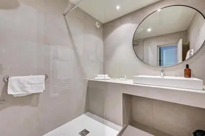 a bathroom with a sink and a mirror at Best Western Sévan Parc Hôtel in Pertuis
