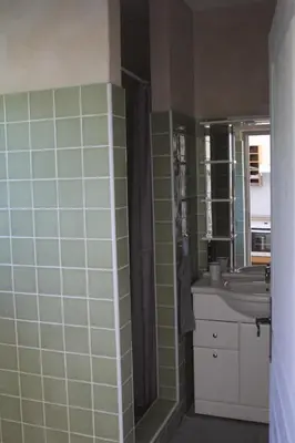 a bathroom with a sink and a mirror at La Caprine in Gordes