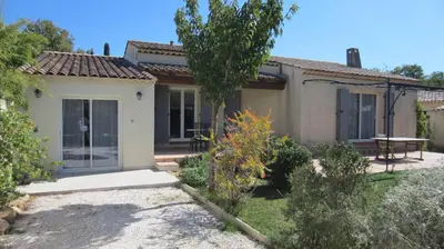 a small house with a garden in front of it at Studio A Grans in Grans