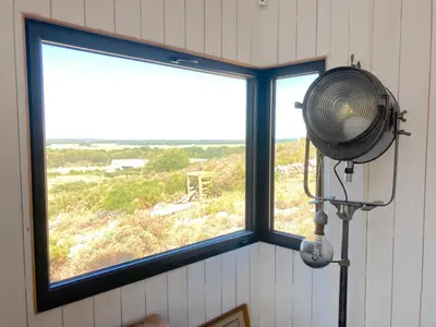 a window with a fan in a room with a view at Belle villa en Provence in Lançon-Provence
