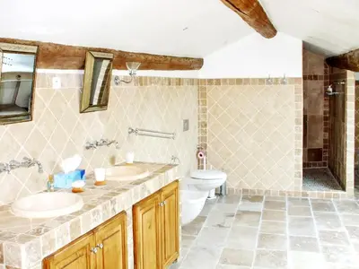 a bathroom with a sink and a toilet at Maison de charme à Mollégès avec piscine privée in Mollégès
