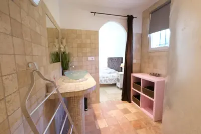 a bathroom with a sink in a room at Nice house with private-pool situated in the heart of the Luberon in Maubec