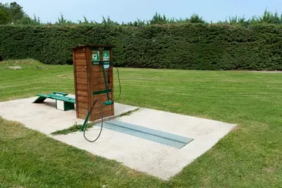 a picnic table and a bench in a field at VTF Les Florans in Bédoin