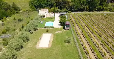 an aerial view of a farm with a train at Maison charmante à Modène avec piscine privée in Modène