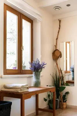 a table in a room with a window at Maison d’Etienne in Lacoste