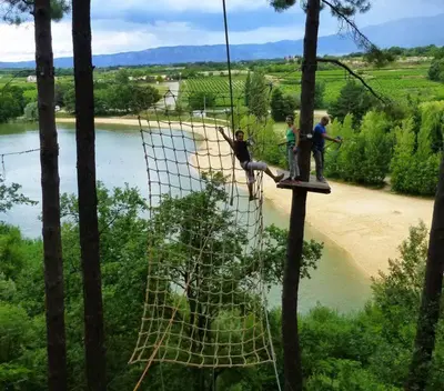 a group of people on a net over a river at Entre Vignes et Collines in Méthamis