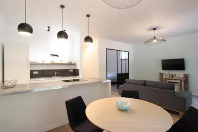 a living room with a table and a couch at 
