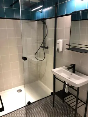 a bathroom with a shower and a sink at Hotel Cantosorgue in LʼIsle-sur-la-Sorgue