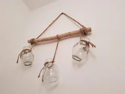 a group of three lights hanging on a wall at BlueBird in Cavaillon