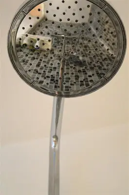 a metal strainer sitting on top of a ceiling at Le Chat Sur Le Toit in Lourmarin