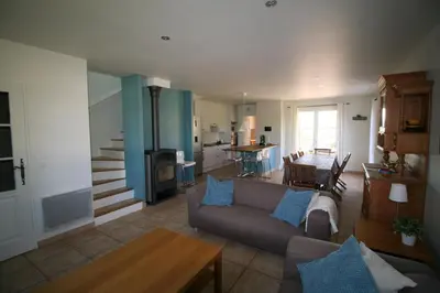 a living room with a couch and a table at 225 Chemin des Joncs in Saint-Pierre-de-Vassols