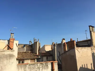 a view of the rooftops of buildings at Studio avec Terrasse in Aix-en-Provence