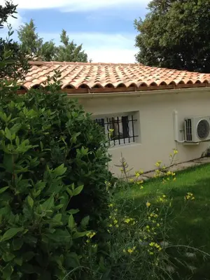 a house with a red roof at studio avec exterieur in Eyragues