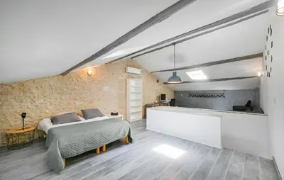 a bedroom with two beds and a counter in a room at Amazing Home In Vedène in Vedène
