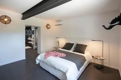 a bathroom with a sink and a mirror at Maison Galatéa in Noves