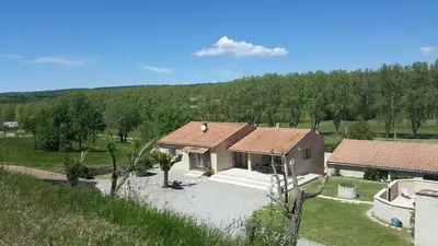 an aerial view of a house in a field at Les Prairies de l'Encrême in Céreste