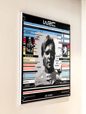 a television screen with a picture of a man at Le Néliö in Aix-en-Provence