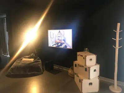 a room with boxes and a light on a wall at Loft piscine et spa provence in LʼIsle-sur-la-Sorgue
