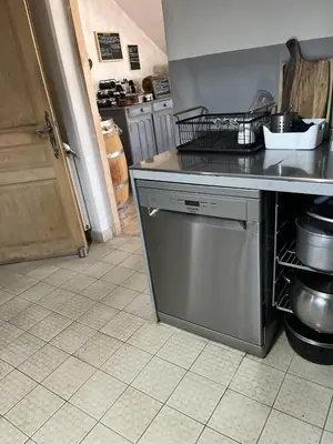 a kitchen with a dishwasher and a counter top at Mas Bastide st Victor à 5 mn de Lourmarin in Puyvert