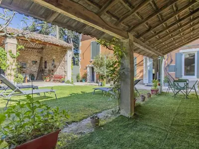 an external view of the garden of a house at Holiday Home Bastide du 19ième by Interhome in Oppède
