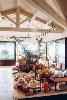 a long table filled with plates of food at Hotel Crillon le Brave in Crillon-le-Brave